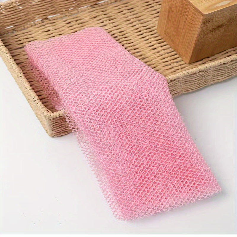 Pink African net exfoliating sponge product packaging and size comparison