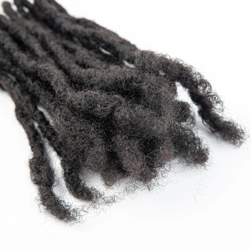 Black synthetic dreadlocks on a white background