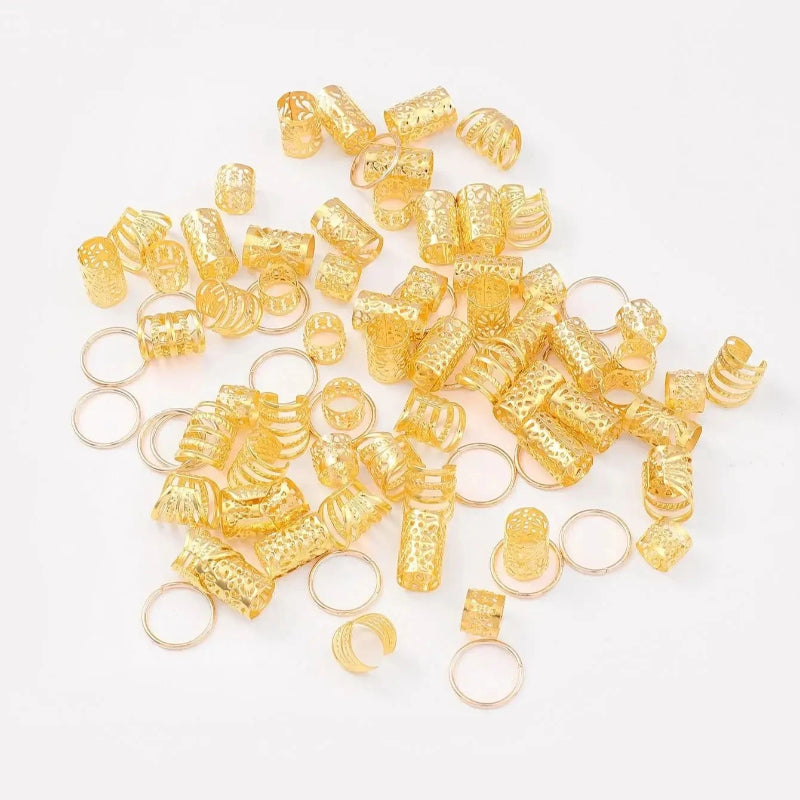 Collection of gold rings on a white background
