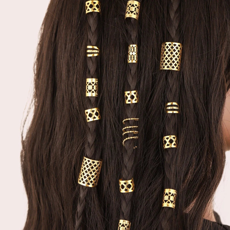 Gold hair beads and rings for dreadlocks styled in braided hair extensions