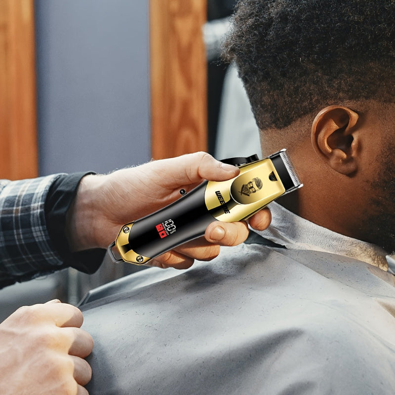 Person using a gold and black hair trimmer on another person's head.