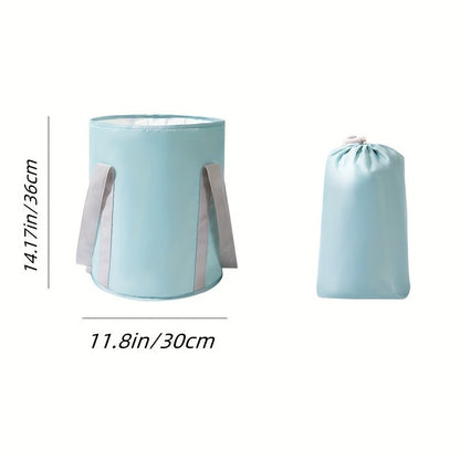 Two light blue laundry bags with gray straps on a white background, showing dimensions.