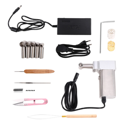 Collection of dreadlock-making tools and equipment on a white background