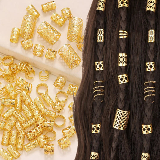 Gold dreadlock hair accessories including rings and cuffs displayed on natural hair"