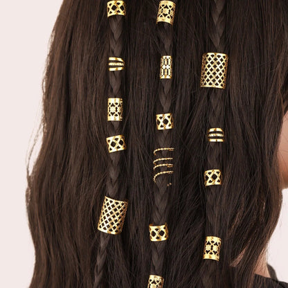 Gold hair beads and rings for dreadlocks styled in braided hair extensions